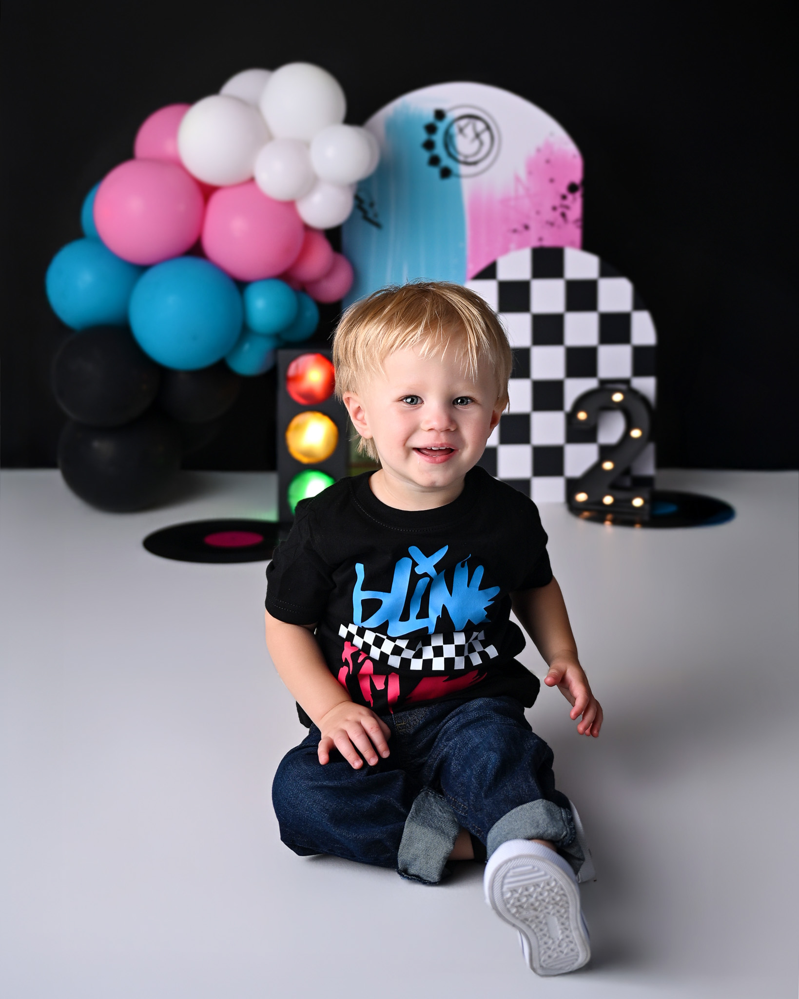 Sitter children posing for a rock and roll theme photography session in Mesa, AZ