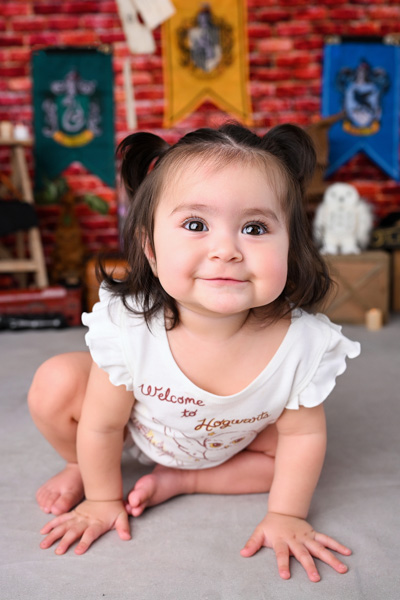 Child sitting and posing for a portrait
