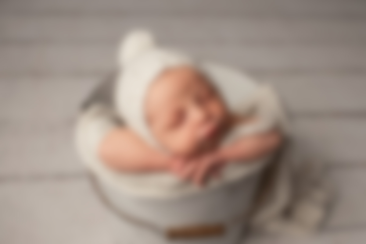 Peaceful newborn photography session setup
