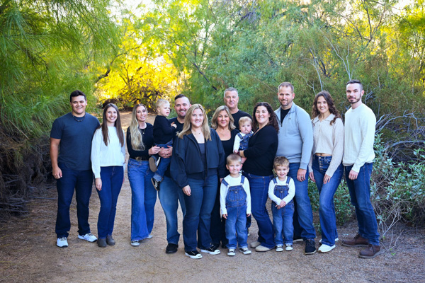 Family embracing outdoors