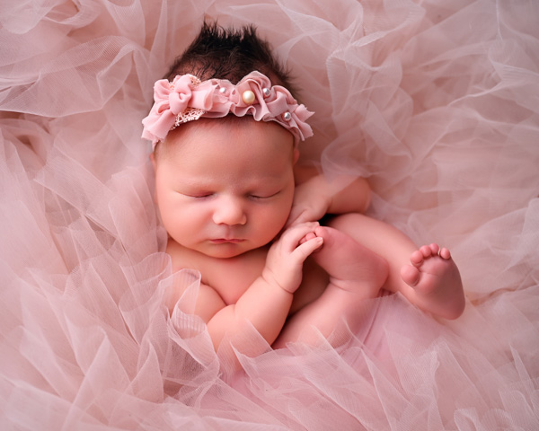 Newborn baby wrapped in a soft blanket