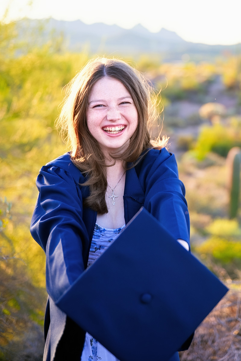 High school senior photographed in soft natural light